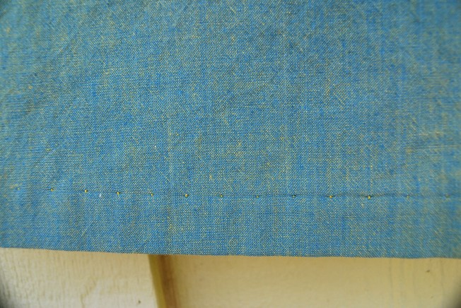 I am a big proponent of blind hme on dresses and skirts, regardless of what is shown in the directions. I'm not opposed to a machine blind hem when possible like here.