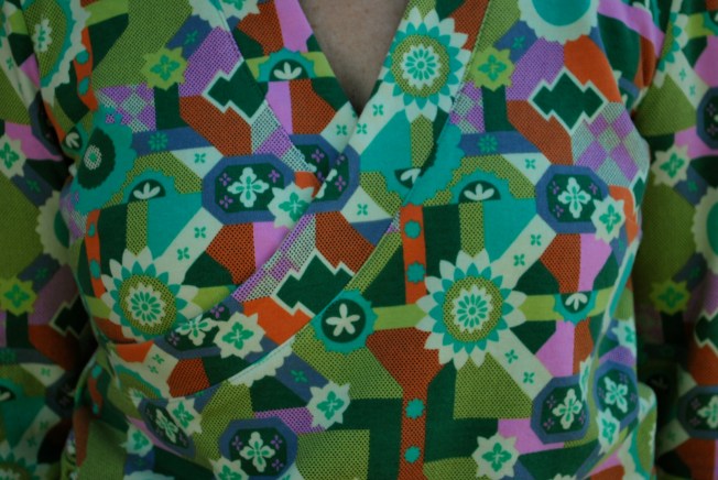 I love the neckline on this top. I usually do not look good in a wrap neckline because of my small bust, but this it cut just right for me.